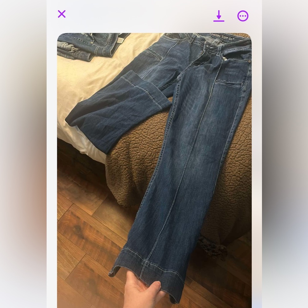 Wide leg flare type blue jeans with front pockets,